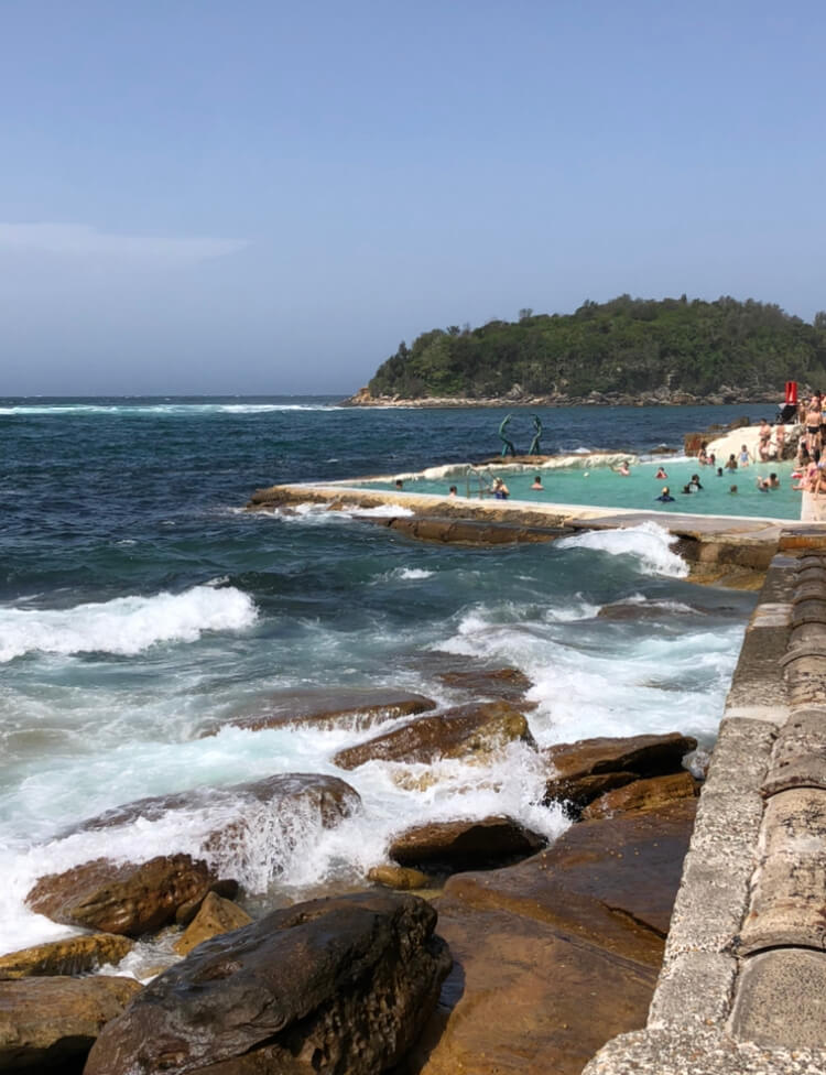 A million-dollar view over the rocks towards the ocean pool at Fairy Bower in Manly.  The Bower Restaurant is the best breakfast place in Manly with a view.
