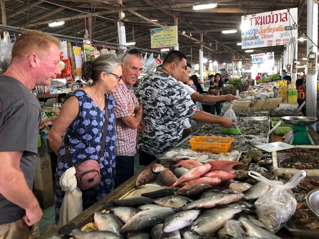 People shopping at a fish market